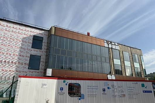 Exterior shot of the Dyson Cancer Centre under construction