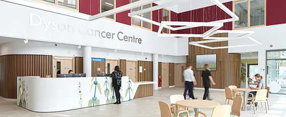 The Atrium of the Dyson Cancer Centre showing seating for patients and the main reception desk