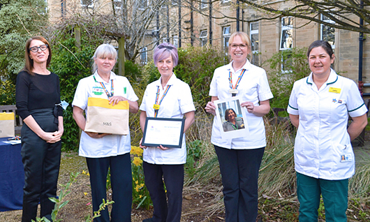 The Cancer Support Team with Chief Executive, Cara Charles-Barks, at the award presentation