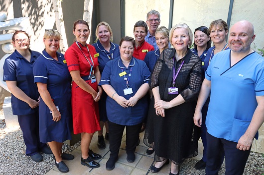 Duncan Burton, right, and Donna Ockenden, fourth from right, with RUH colleagues