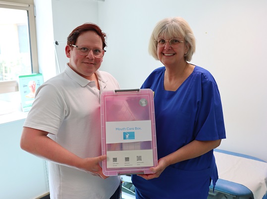 photo of Lorraine and Scott with Mouthcare Box